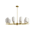 Gold-toned multi-arm chandelier with frosted globe shades, upward bulb openings