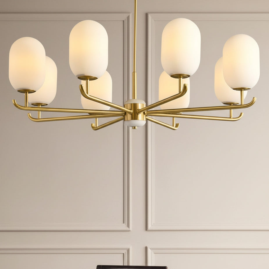 Sputnik-style chandelier canopy with multiple frosted glass shades and gold arms