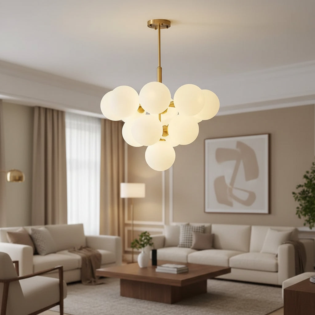 Gold bubble globe chandelier with frosted white glass globes in a bright living space