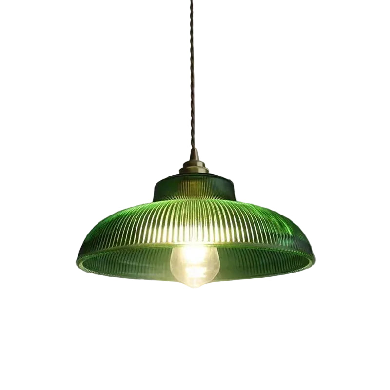 Green ribbed glass dome pendant light with brass socket and hanging cord