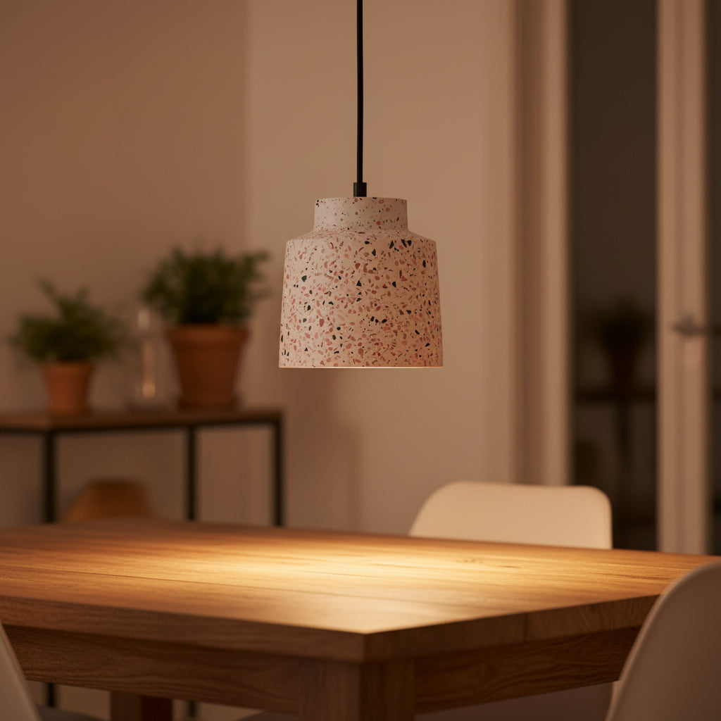 Stepped drum pendant light with speckled white shade and black hanging cord