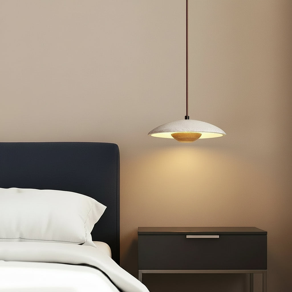 Travertine dome pendant light with wooden core, warm amber glow from inside shade