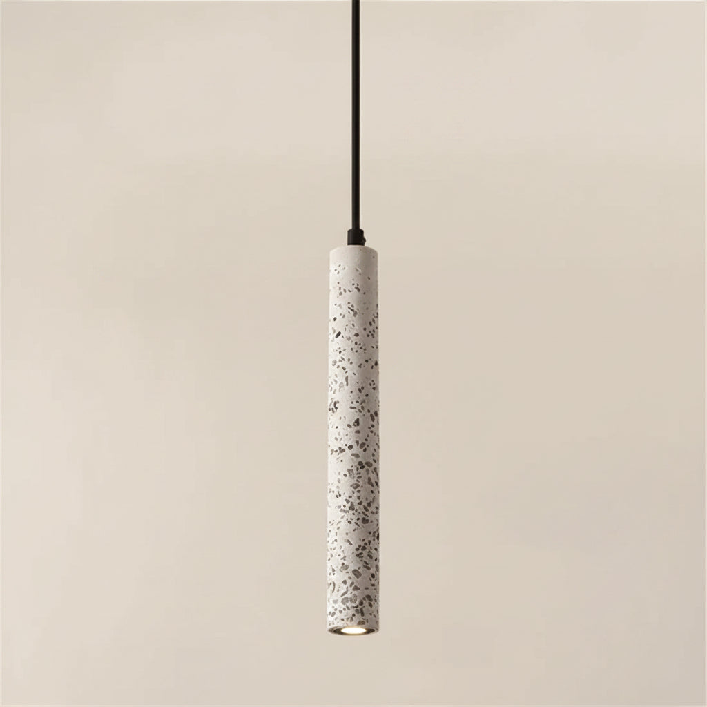 Speckled white cylindrical pendant light with black cord and open top.