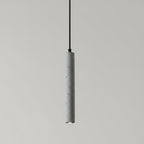 White speckled cylindrical pendant light with black cord and small downlight.
