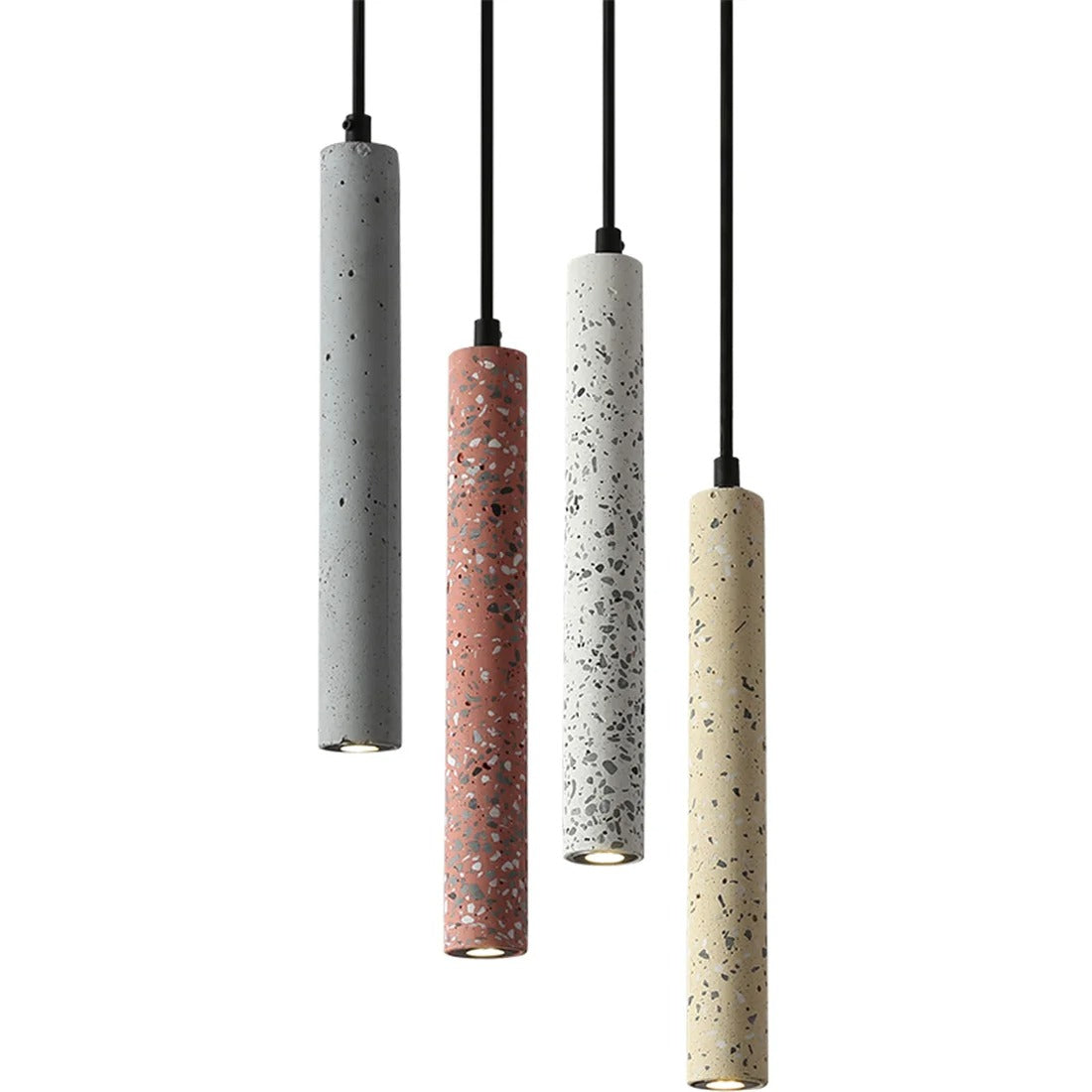 Set of speckled cylindrical pendant lights in gray, red, and cream with black cords.