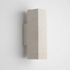 Concrete wall light with cylindrical shade, sand white finish and wall-mounted bracket