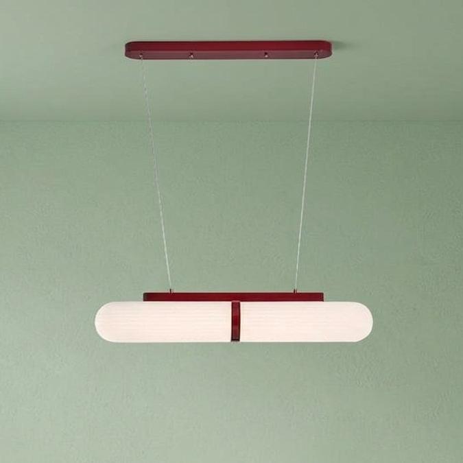 Izor linear fluted chandelier: two ribbed white cylindrical shades with red mounting bar