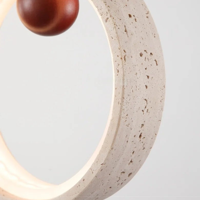 Textured travertine halo ring for pendant light with warm inner light