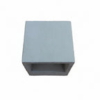 Square concrete wall light block with flat front and recessed opening