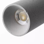 Grey speckled tubular downlight head with visible lens and reflective bulb insert