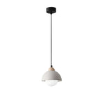 Dome pendant light with gray outer shade and white diffuser, black cord