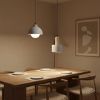Cylinder pendant light with white shade and black cord