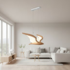Wooden bird-style pendant light with LED glow, suspended from a ceiling bar