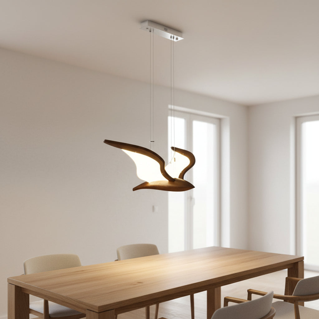Wooden bird-style pendant light with LED glow and curved wing shade, hanging from ceiling