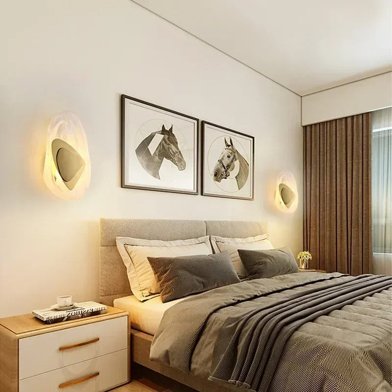 Egg-style wall sconce with warm light, black inner oval shade