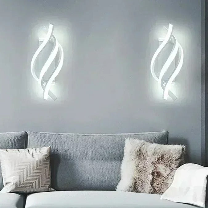 Twisted spiral wall sconce with white LED glow, curved metal shade, wall-mounted.