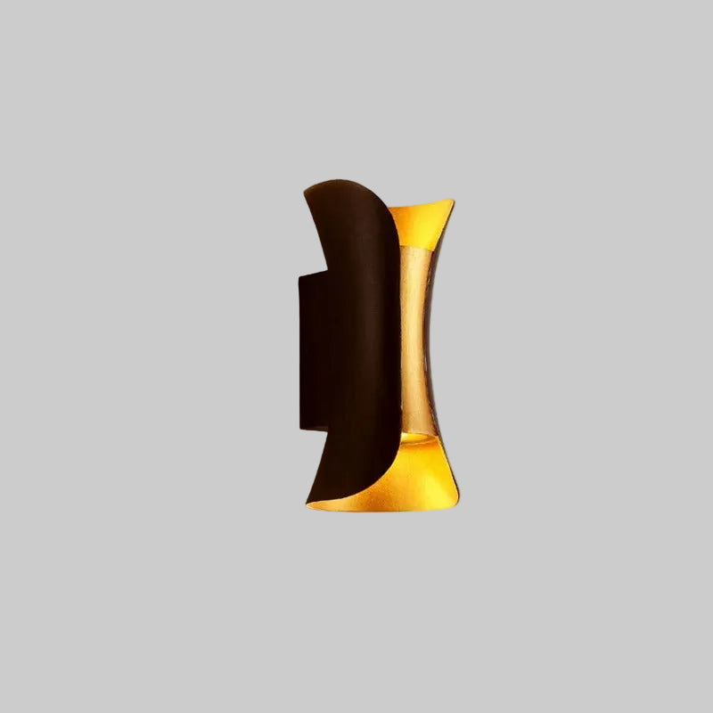Black up-and-down wall light with gold interior reflector