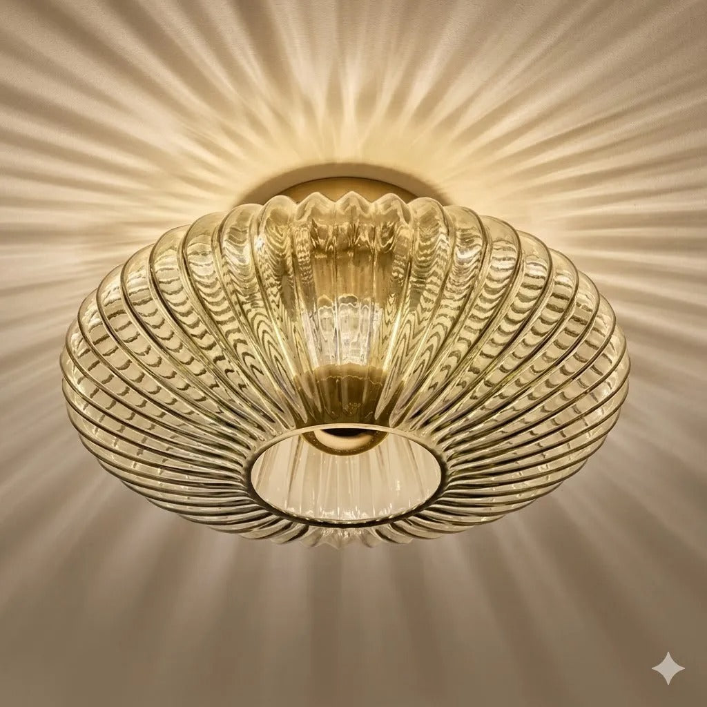 Amber fluted saucer ceiling light with ribbed glass shade and central round opening