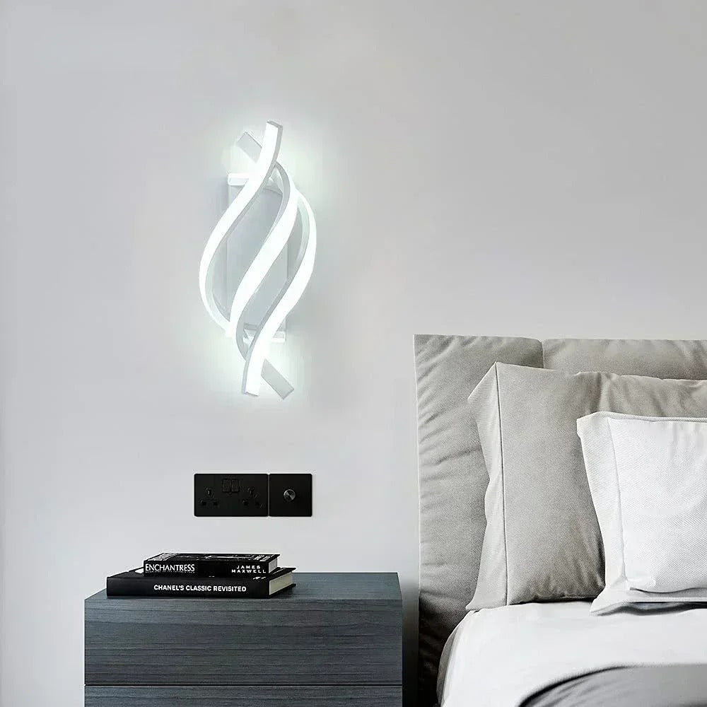 Twisted spiral wall sconce with white LED glow, curved metal body and wall mount.