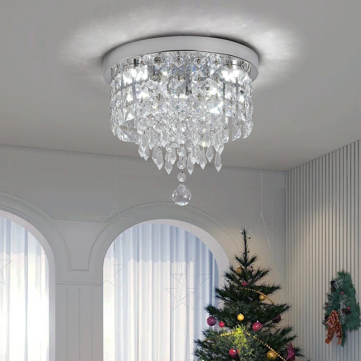 Tiered crystal ceiling light with circular drum, faceted drops, and hanging teardrop
