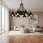 Rope-and-black cone chandelier hanging over living room seating with exposed bulbs