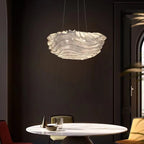 Jora cloud-shaped wave chandelier with layered wavy shade emitting light