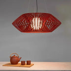 Red diamond tapered hanging chandelier with open lattice shade and warm glowing interior
