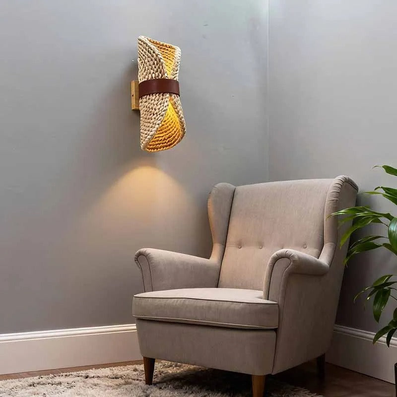 Wall-mounted rattan scroll wall light with woven shade and dark band