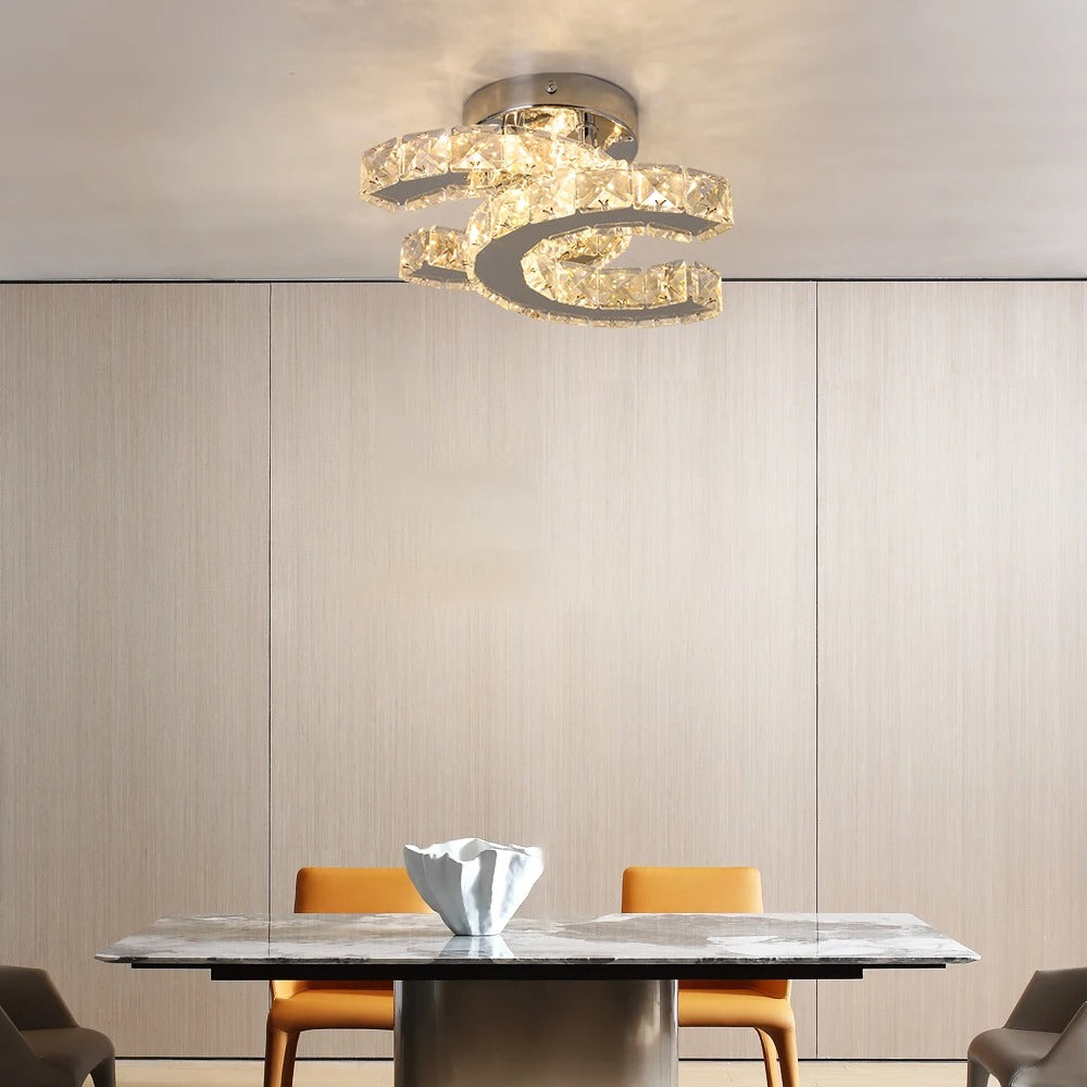 Crystal interlocking ring ceiling light in chrome, centered circular crystal bands