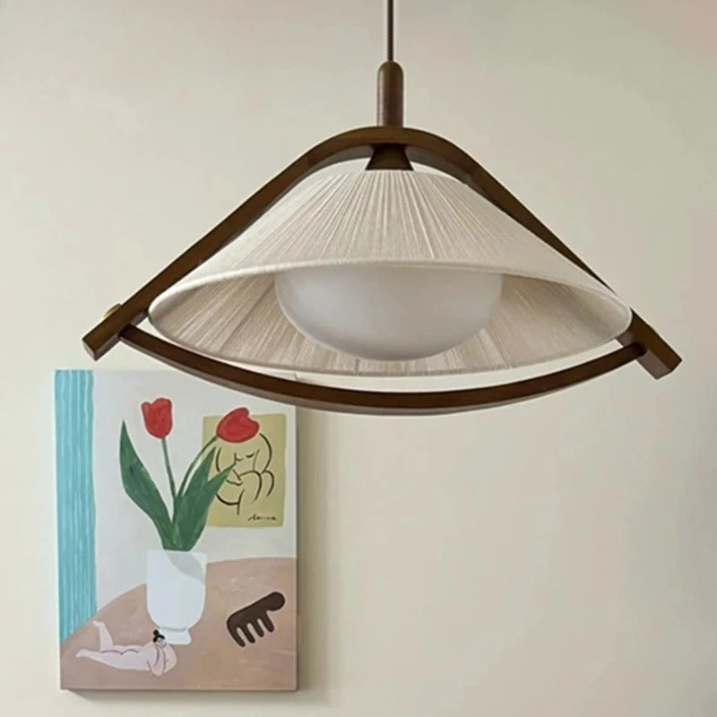 Conical fabric pendant light with dark wood ring and white shade