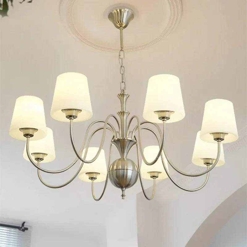 Conical multi-arm chandelier with multiple white drum shades and central globe