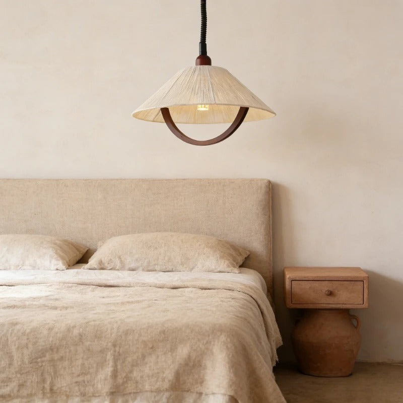 Linen cone pendant light with dark brown ring and ribbed fabric shade