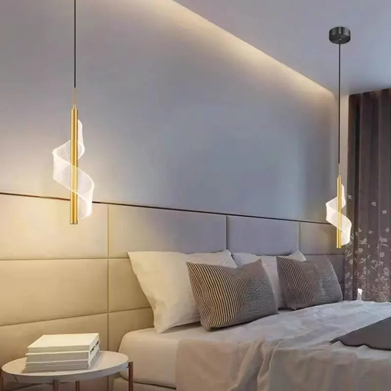 Set of two gold spiral vertical rod pendant lights with translucent shades