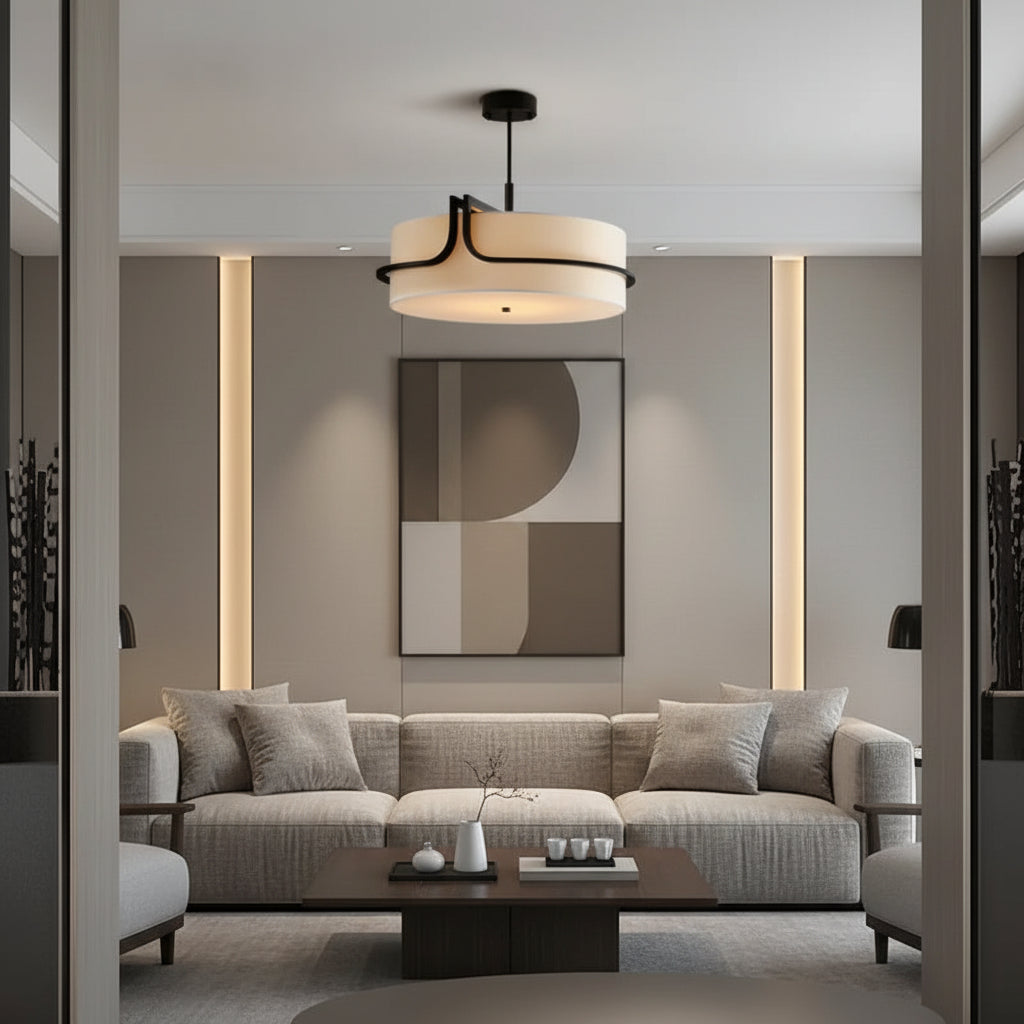 Round drum chandelier with open frame and beige fabric shade, suspended ceiling mount