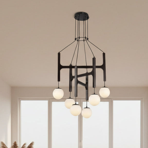 Black H-frame globe chandelier with multiple hanging glass bulbs and round ceiling canopy