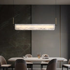 Minimalist linear alabaster bar chandelier with frosted white diffuser and gold suspension rods
