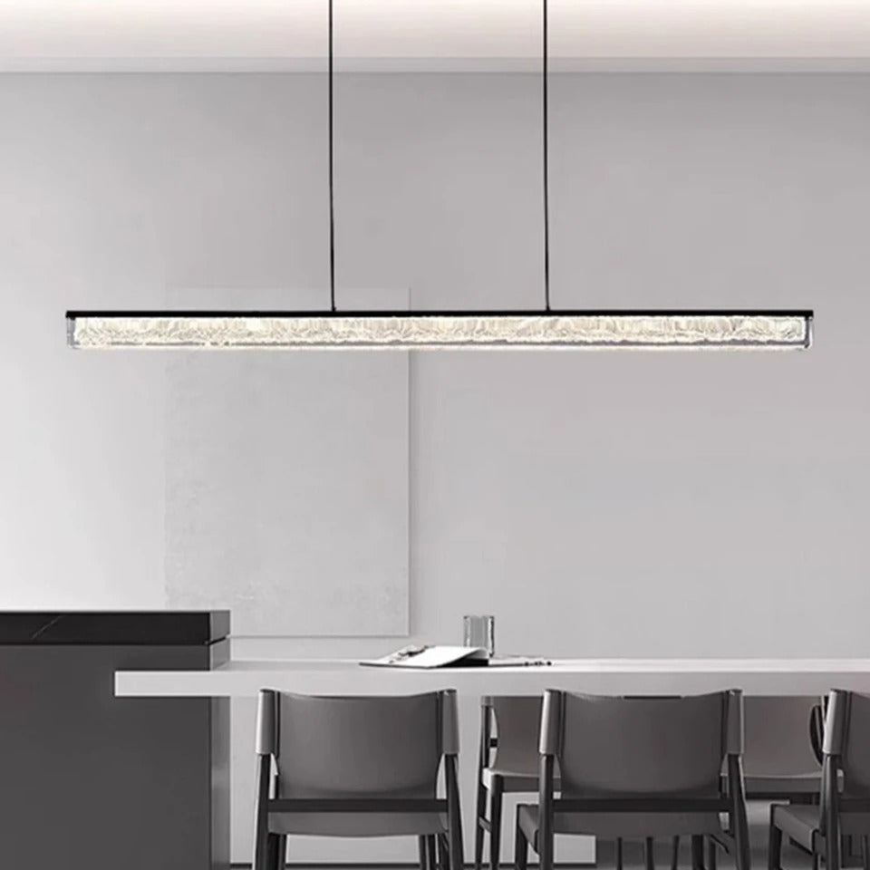 Rectangular bar chandelier with rectangular glass diffuser trim, hanging from cords