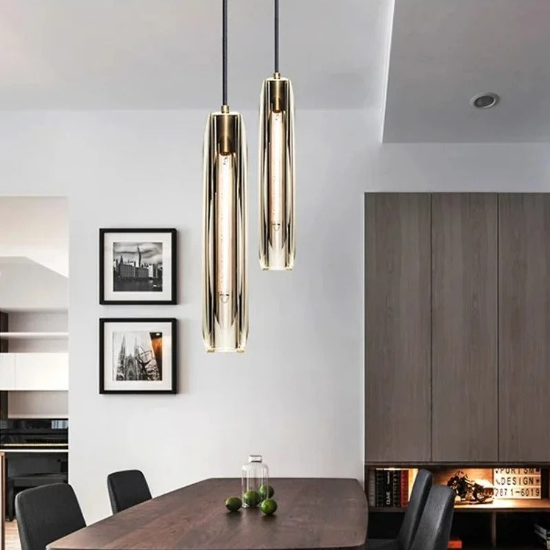Brass-tone crystal cylindrical pendant light with two hanging glass cylinders