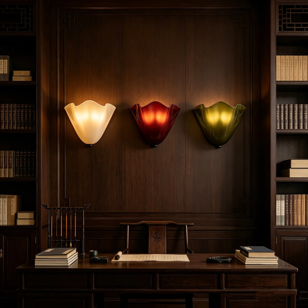 Glowing scalloped wave glass wall lights with cream, red, and green shades and black caps