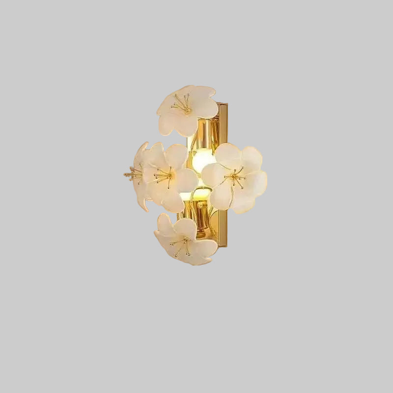 Botanical wall light with gold metal backplate and white petal flower shades