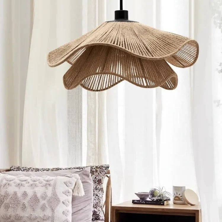 Woven rope hat-style pendant light shade with scalloped brim on black stem