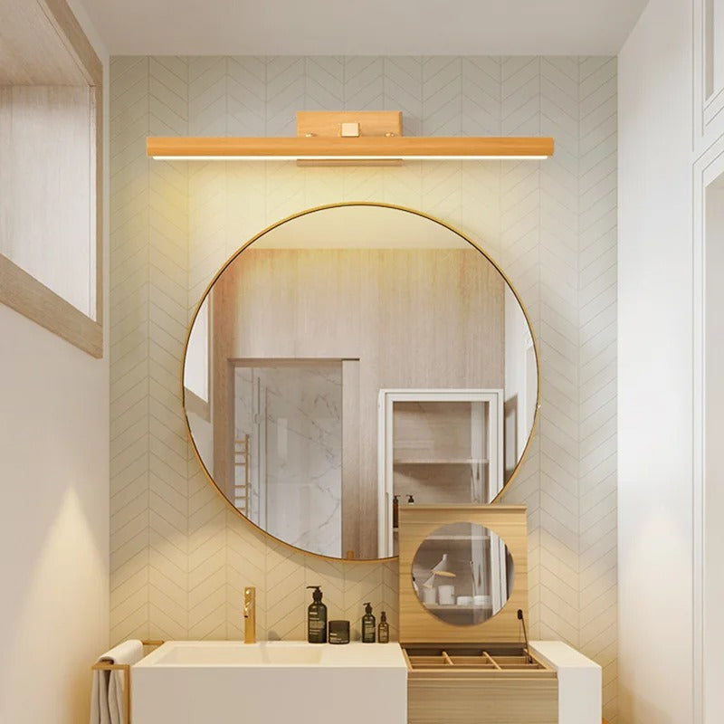 Light wood linear wall light with warm LED strip on wall