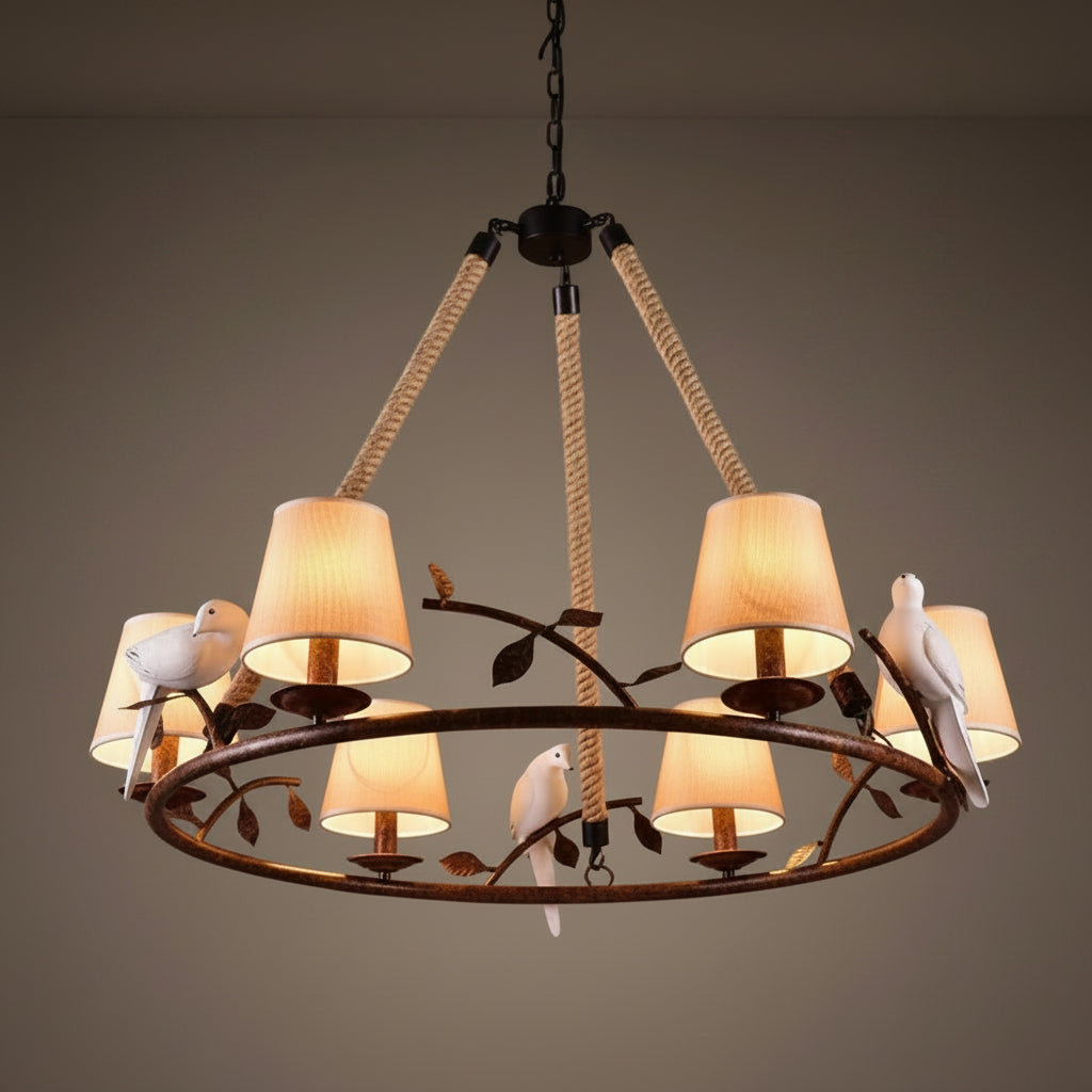 Bird chandelier featuring hemp ropes, black ring base, and warm amber drum lamp shades