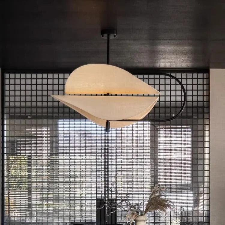 Curved fabric pendant light with two off-white layered shades and black stem