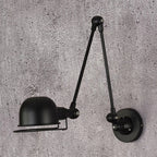 Black swing arm dome wall light with two adjustable arms and round wall mount
