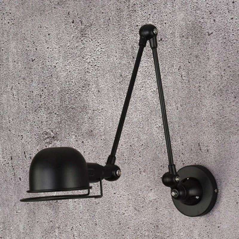 Black swing arm dome wall light with two adjustable arms and round wall mount