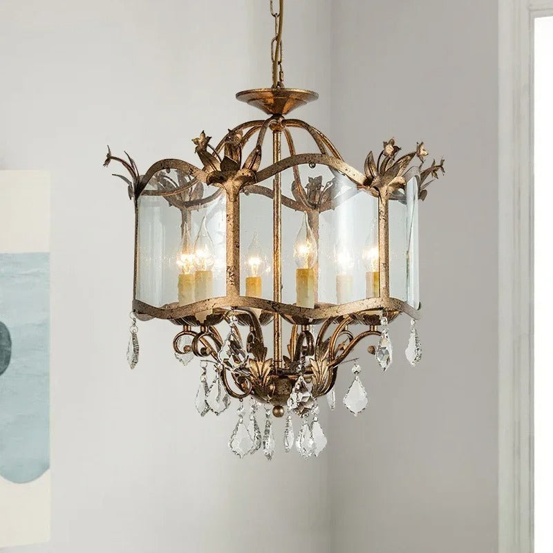 Crown motif pendant chandelier with clear glass shades, candle bulbs, dangling crystal drops