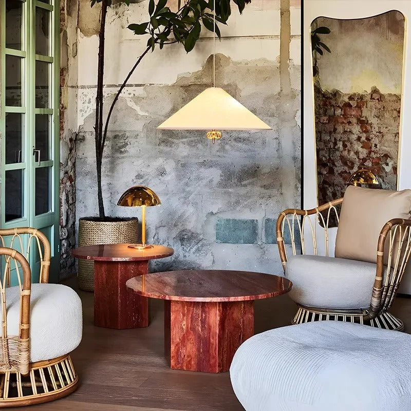Cone pendant light with light fabric shade and brass socket detail