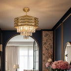 Gold hexagonal tiered crystal chandelier with hanging clear crystal fringe