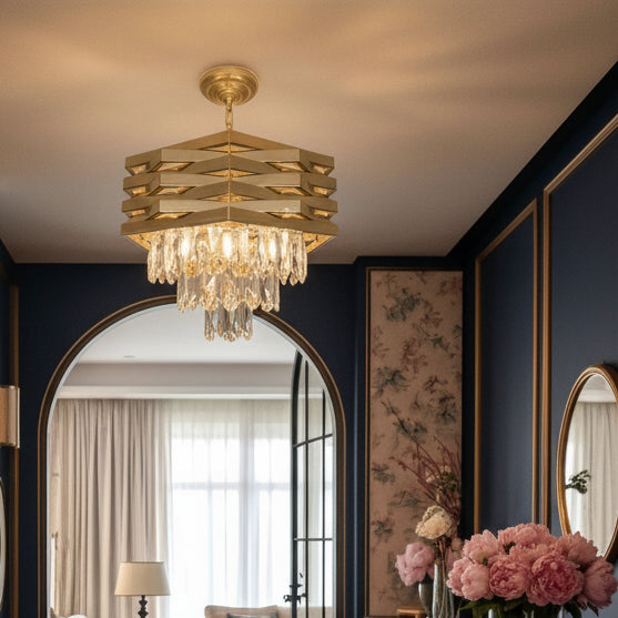 Gold hexagonal tiered crystal chandelier with hanging clear crystal fringe